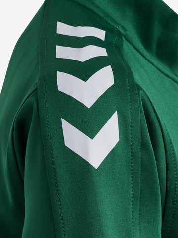 Veste de survêtement 'CORE XK POLY' Hummel en vert