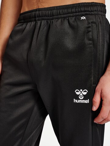 Regular Pantalon de sport Hummel en noir