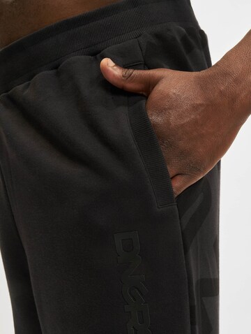 Urban Classics Regular Trousers 'Dangerous' in Black