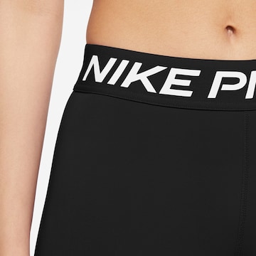 NIKE Skinny Sporthose in Schwarz