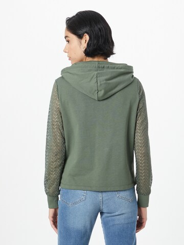 ABOUT YOU Sweatshirt 'Svenja' (GOTS) in Grün