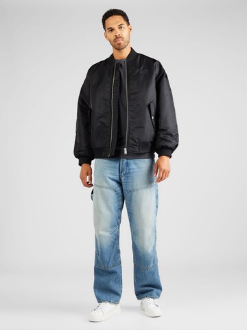 Tommy Jeans Jacke in Schwarz