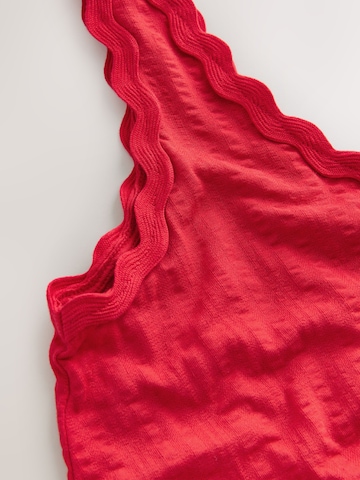 Combinaison Next en rouge