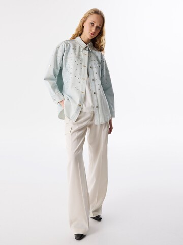 Veste mi-saison Twist en bleu