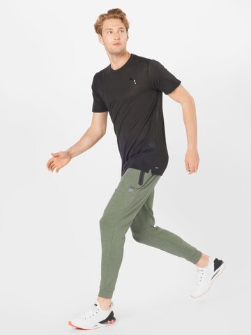 PUMA Funktionsshirt in Schwarz