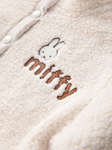 Next Fleecetakki värissä beige