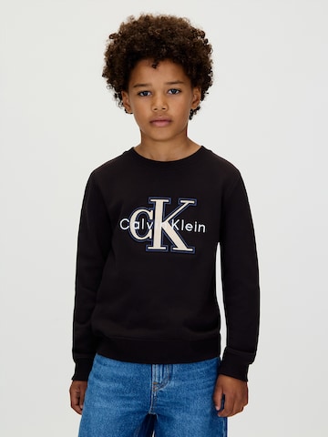 Calvin Klein Jeans Dressipluus 'FESTIVE', värv must: eest vaates