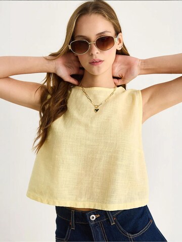 Top di Bianco Lucci in giallo