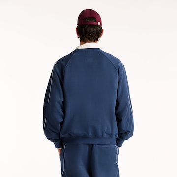 new balance Sweatshirt 'Trackside' in Blau