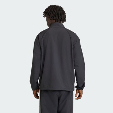 ADIDAS ORIGINALS Tussenjas 'Adicolor' in Zwart