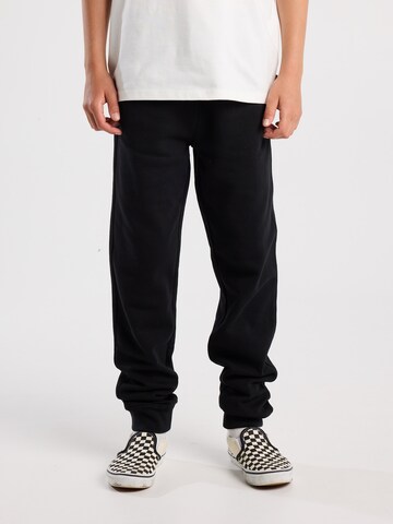 America Today Tapered Trousers in Black: front