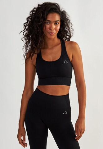 BeShaped Bralette Sports bra 'Femme Force' in Black: front