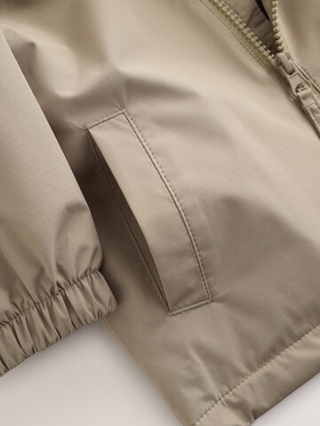 Next Tussenjas in Beige