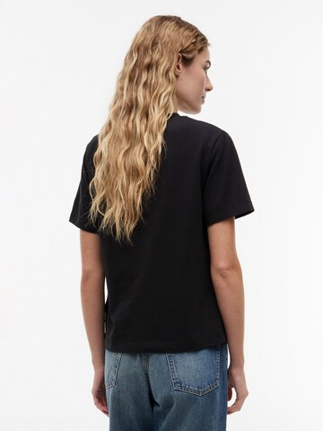 Maglietta di TOMMY HILFIGER in nero