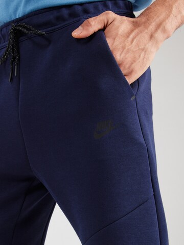 Nike Sportswear Tapered Παντελόνι 'TCH FLC' σε μπλε