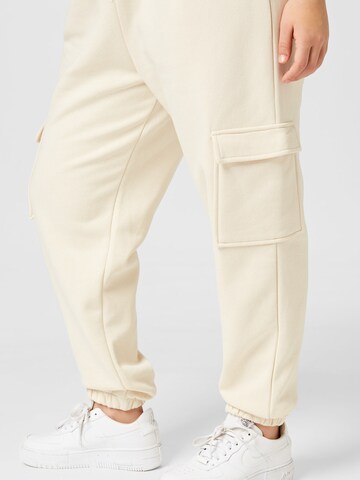 River Island Plus Tapered Cargo trousers in Beige