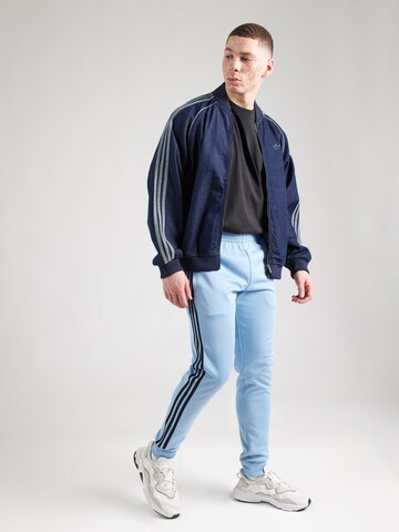 ADIDAS ORIGINALS Tapered Bukser 'Adicolor Classics Sst' i blå