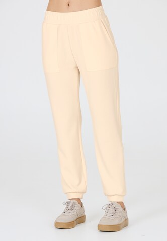 Athlecia Regular Sportbroek 'Elaina' in Beige: voorkant