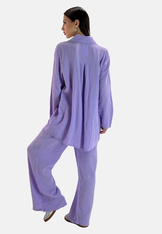 Elara Huispak in Lila