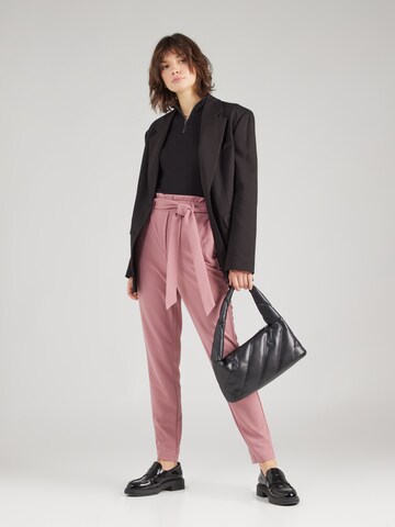 VERO MODA Tapered Housut värissä vaaleanpunainen