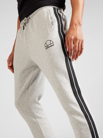 ELLESSE - Tapered Calças de desporto 'Condizione' em cinzento