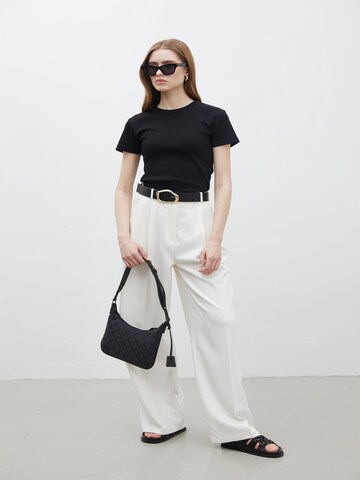 MANUKA T-Shirt in Schwarz