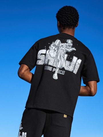 BershkaMajica - crna boja: prednji dio