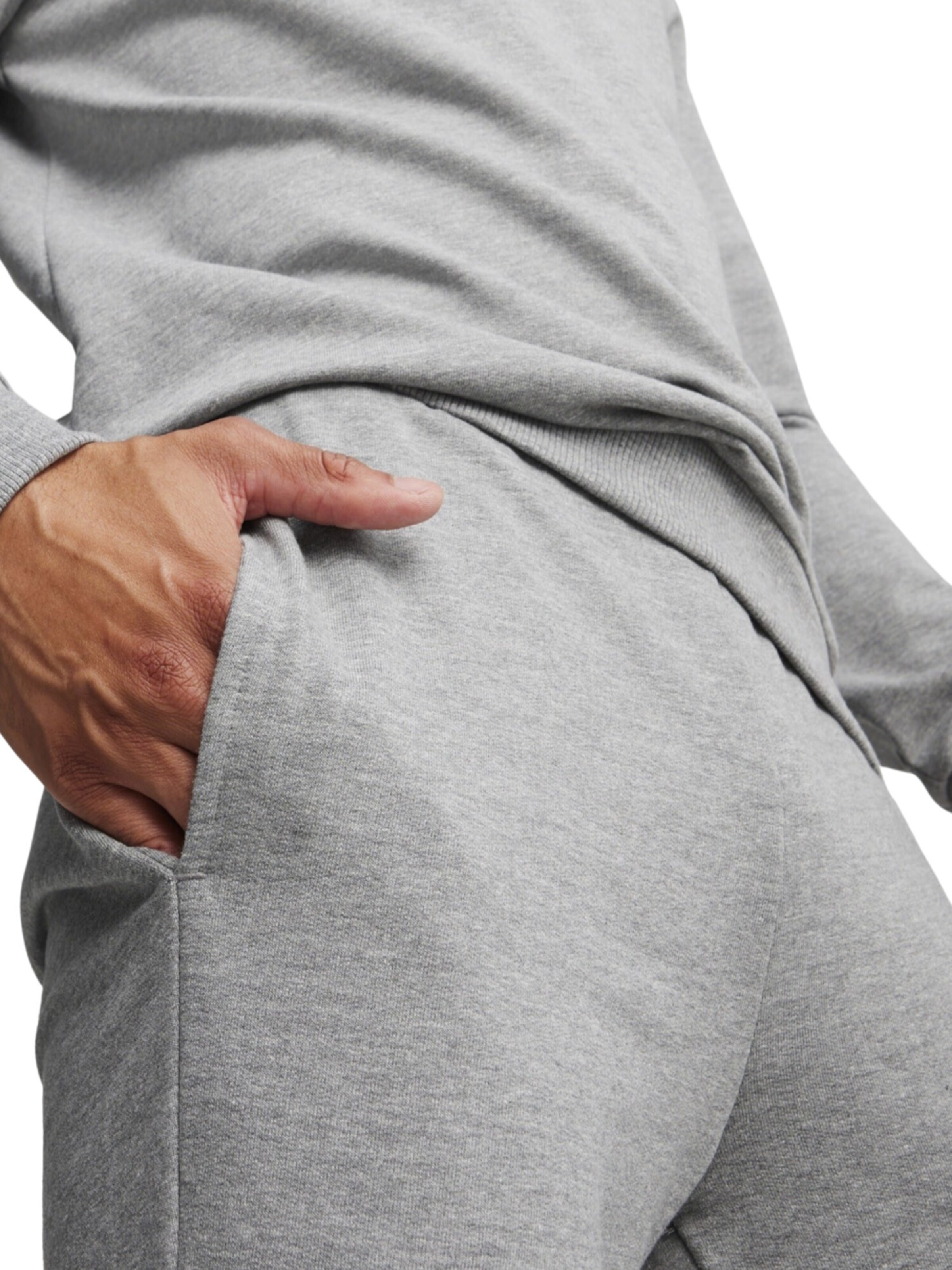 Tapered Pantaloni sportivi 'Team Goal' di PUMA in grigio