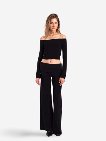 THE-ARE Flared Trousers in Black