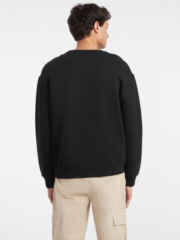 GUESS JEANS Sweatshirt in Schwarz