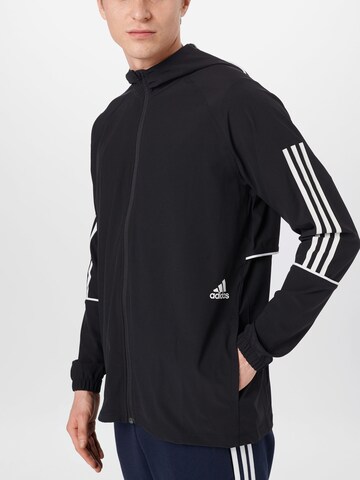 Jachetă de trening de la ADIDAS SPORTSWEAR pe negru