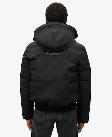 Superdry Tussenjas in Zwart