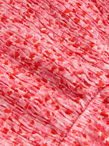 Ensemble Next en rose