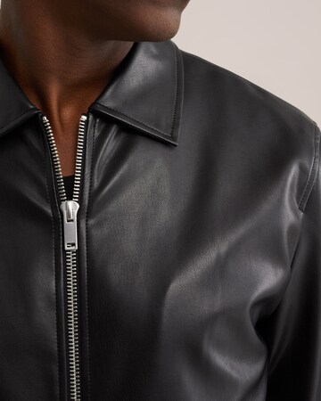 WE Fashion Tussenjas in Zwart