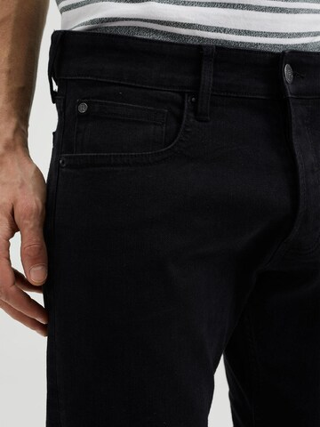 WE Fashion Slimfit Jeans in Zwart