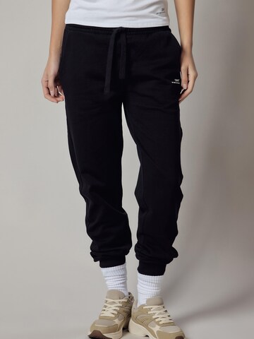 regular Pantaloni di OWN Off With Nature in nero: frontale