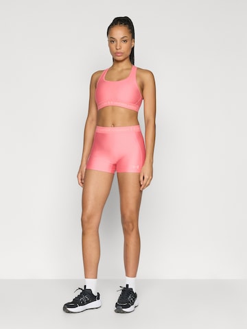 UNDER ARMOUR Skinny Sportbroek in Roze