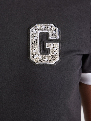 GUESS T-Shirt in Schwarz