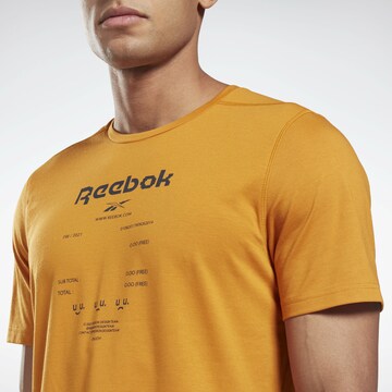 Reebok Functioneel shirt 'Graphic Move' in Oranje