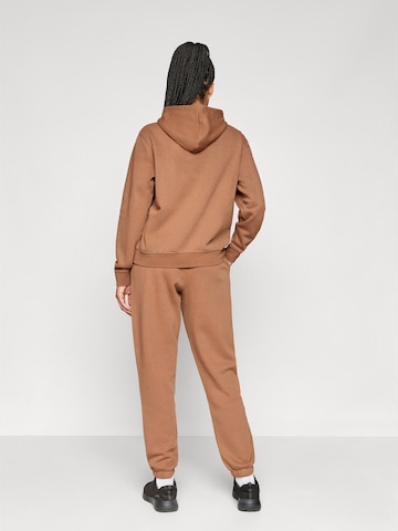 Tapered Pantaloni sport 'ONPJONI' de la ONLY PLAY pe maro