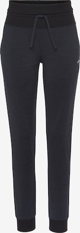 FAYN SPORTS Tapered Workout Pants in Black: front