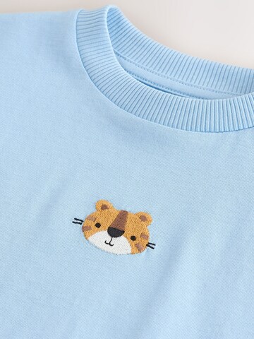 T-Shirt Next en bleu