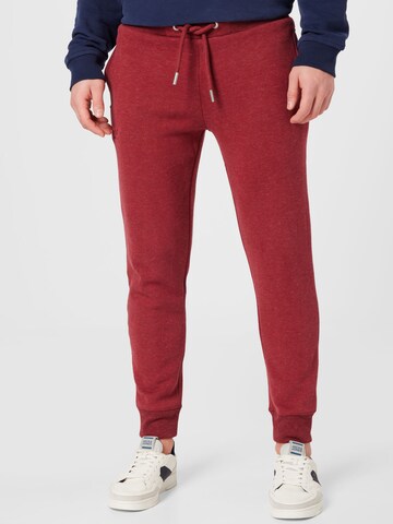 Superdry - Tapered Pantalón en rojo: frente