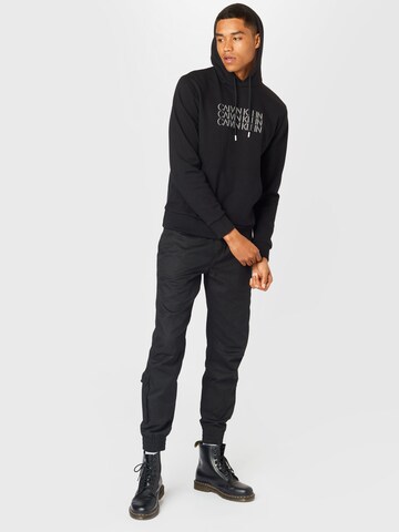 Bluză de molton de la Calvin Klein pe negru
