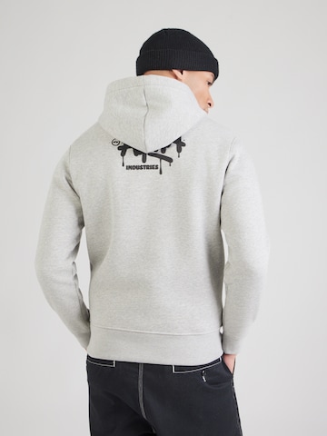 ALPHA INDUSTRIES Tréning póló 'Signature' - szürke