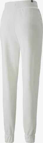 PUMA - Tapered Pantalón deportivo en blanco