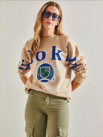 Bianco Lucci Sweatshirt in Bruin