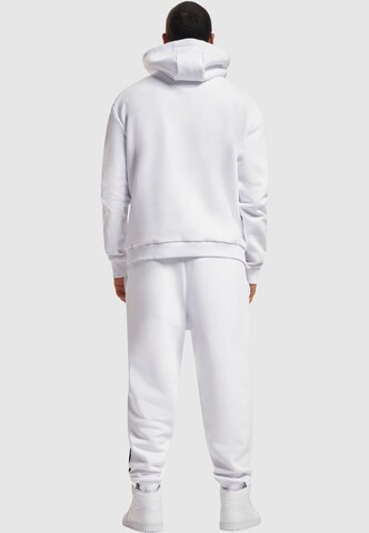 Tuta da jogging 'Essential' di Karl Kani in bianco