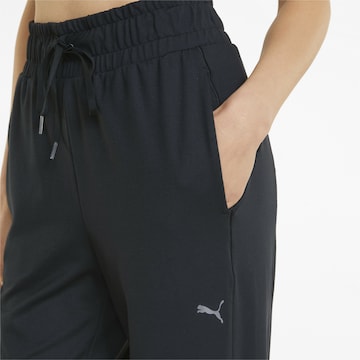 Tapered Pantaloni sportivi 'Studio Foundations' di PUMA in nero