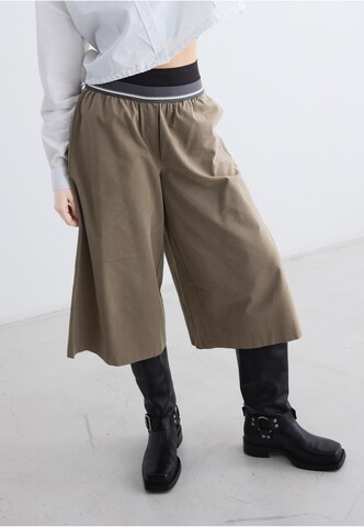rethinkit studios Regular Trousers 'Move' in Brown: front